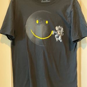 Threadless astronaut smiley face T-shirt